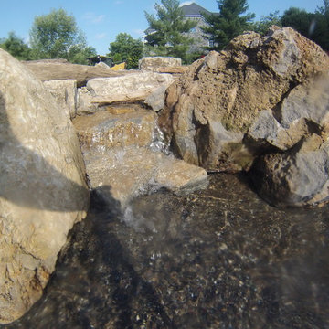 Natural Stone Waterfall in Swimming Pool