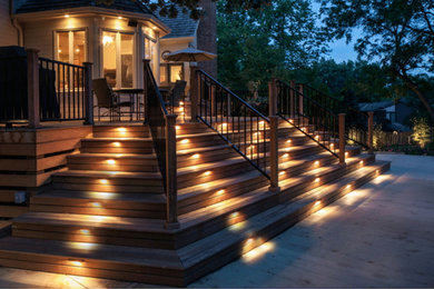 Patio - mid-sized transitional backyard patio idea in Austin with decking and no cover
