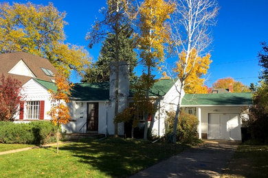 Mid-sized traditional one-storey white exterior in Denver with mixed siding and a gable roof.