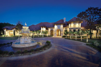Tuscan exterior home photo in Dallas