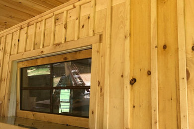 Garage workshop - small farmhouse detached two-car garage workshop idea in Atlanta