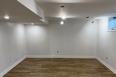 Elegant basement photo in Toronto