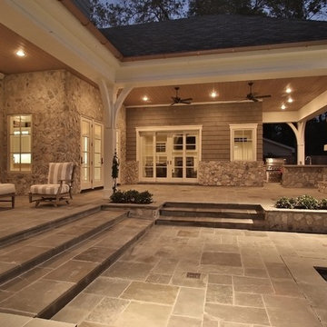 Stone and Cedar Shake come together for this Southern Living Style home
