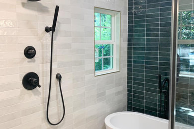 Inspiration for a mid-sized 1950s master ceramic tile and beige floor bathroom remodel in Charlotte with green walls and a hinged shower door