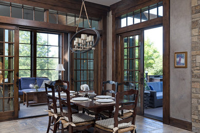 Inspiration for a large timeless travertine floor dining room remodel in Kansas City with gray walls