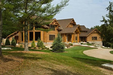 Rustic exterior home idea in Milwaukee