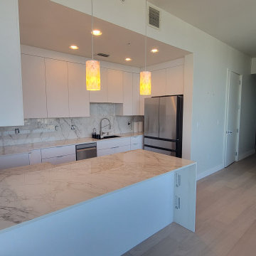 Modern Kitchen Remodel Done in New Glossy White Cabinets