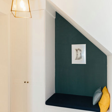 Sleek and stylish under-stair seating and storage