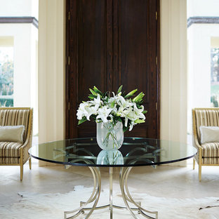 Idéer för att renovera en eklektisk ingång och ytterdörr, med vita väggar, travertin golv, en dubbeldörr och mörk trädörr