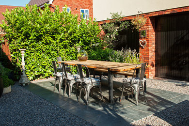 Patio - contemporary patio idea in Gloucestershire