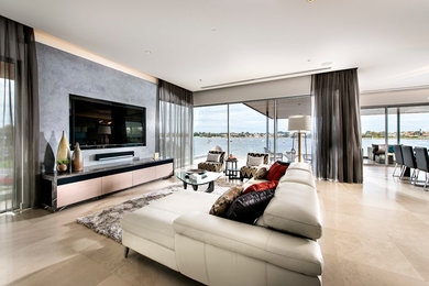 Photo of a large contemporary open concept living room in Perth with grey walls, marble floors and a built-in media wall.
