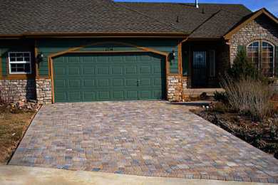 Inspiration for a mid-sized contemporary attached two-car carport remodel in Denver
