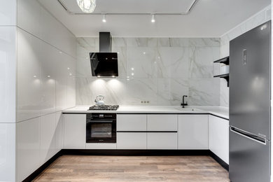 Photo of a mid-sized contemporary kitchen in Other.