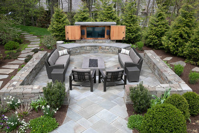 Example of a classic backyard patio design in New York