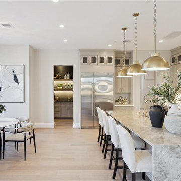 Open kitchen with butler's pantry and professional appliances