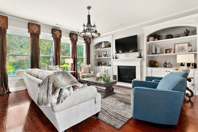 Example of a transitional family room design in Atlanta
