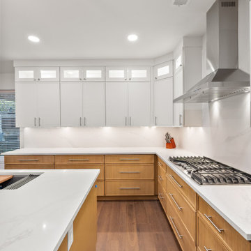 Drop-In Gas Cooktop and Full-Height Quartz Backsplash After Remodel