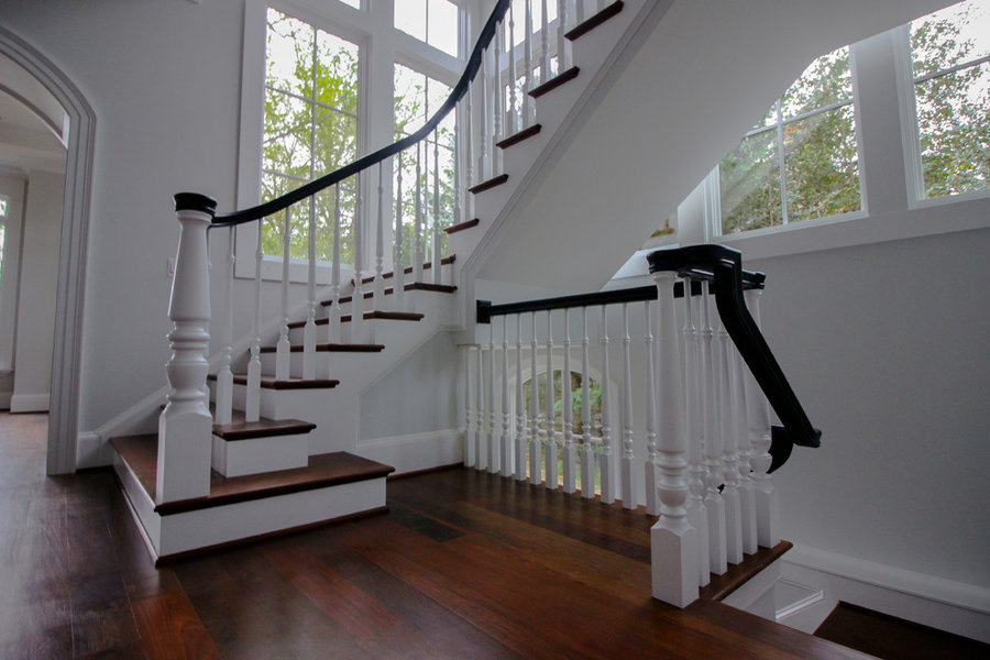 Powerful Impression by Floating Staircase in Suburban Foyer