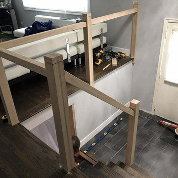 Installation of new modern stainless steel stair railing