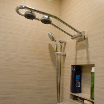Rotating dual shower heads and hand held sprayer.