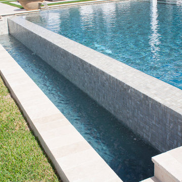 Big Pool with Infinity Edge and Custom Water Bowls in Davie, Florida
