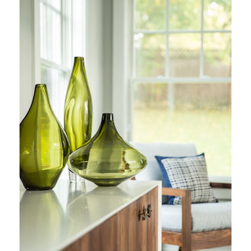 Glassware contracts against the darker wood elements
