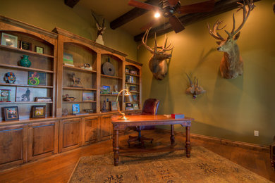 Inspiration for an eclectic home office remodel in Austin