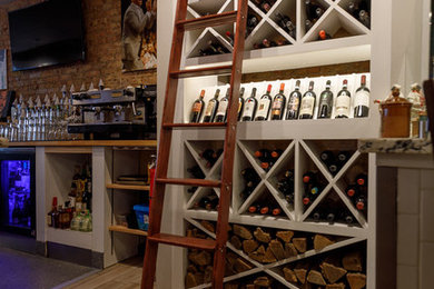 Inspiration for an industrial wine cellar remodel in Milwaukee
