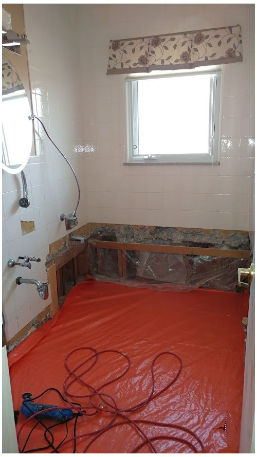 tile around shower window that is not centered