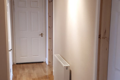 Design ideas for a large traditional hallway in Edinburgh with laminate floors.