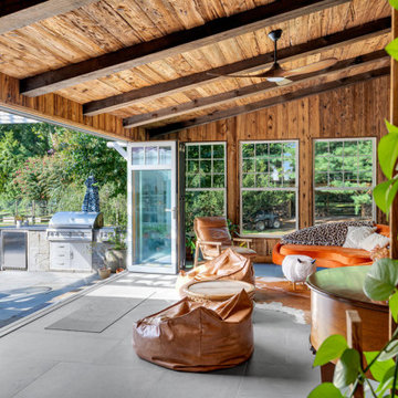 A NJ Sunroom: Harmonious Blending of Inside to Out with Wood Framed Patio Doors