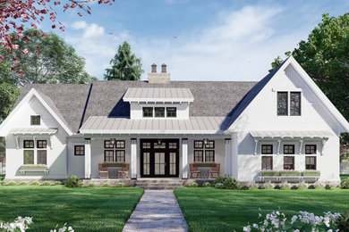 Mid-sized cottage white one-story wood and clapboard exterior home idea with a mixed material roof and a gray roof
