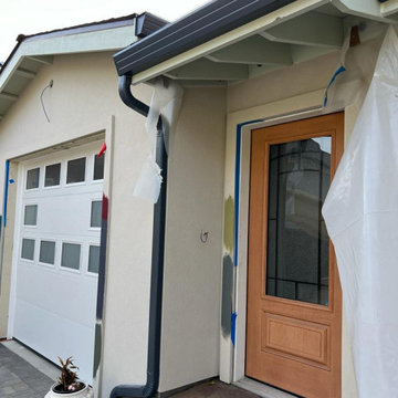 New Gutters and Downspouts