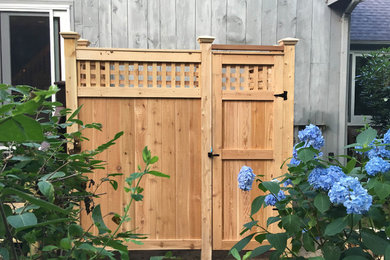 Example of a beach style patio design in Boston