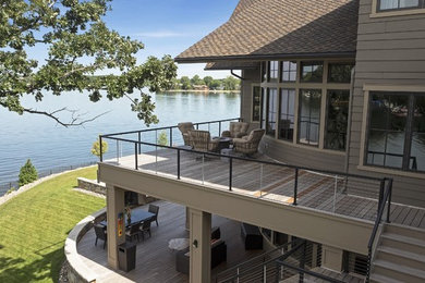 Example of a huge arts and crafts balcony design in Minneapolis with no cover