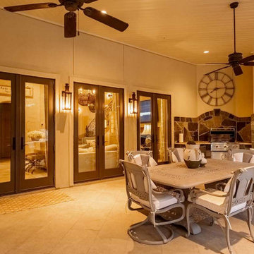Rectangular pool, covered patio and kitchen, outdoor shower, landscaping