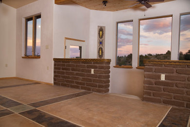 Inspiration for a mid-sized southwestern concrete floor sunroom remodel in Albuquerque