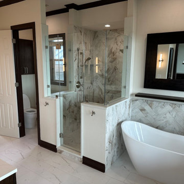 Bathroom Remodel Done With New Vanity Cabinets and Tub