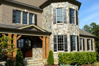 Example of an arts and crafts exterior home design in Cleveland