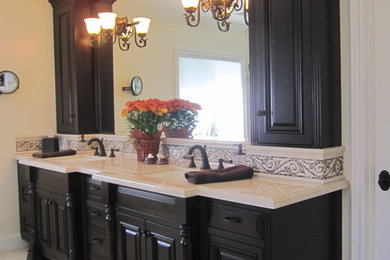 Large elegant black and white tile and ceramic tile ceramic tile bathroom photo in Los Angeles with raised-panel cabinets and yellow walls
