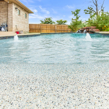 Freeform Pool, beach entry and rock waterfall