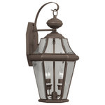 Livex Lighting - Georgetown Outdoor Wall Lantern, Bronze - The Georgetown looks to add regal elegance to your home with a line of lighting that embodies classic design for those who only want the finest. Using the highest quality materials available, the Georgetown begins with solid brass so that each fixture not only looks fantastic, but provides a fit and finish that will last for years as well.
