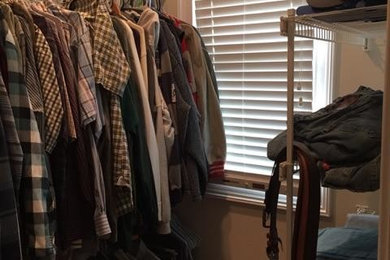 Inspiration for a large walk-in closet remodel in Other