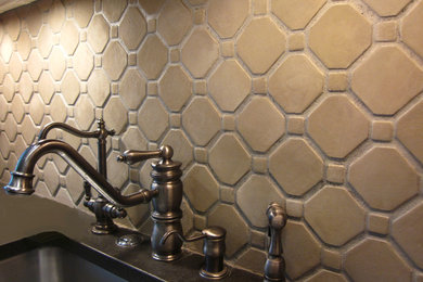Mid-sized trendy limestone floor kitchen pantry photo in New York with a drop-in sink, gray cabinets, beige backsplash, stone tile backsplash, stainless steel appliances, raised-panel cabinets and quartz countertops