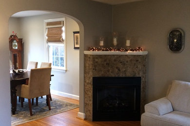 Living room - contemporary living room idea in Philadelphia with gray walls and a tile fireplace
