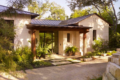 Inspiration for a mediterranean exterior home remodel in Austin