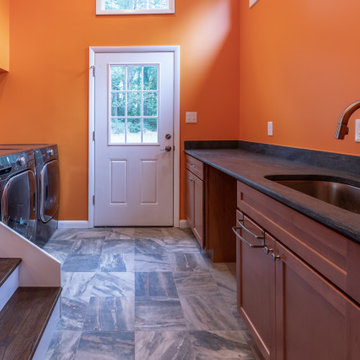 Cheerful Multi Level Rear Addition to Expand Kitchen, Mudroom & Sunroom in Oakt