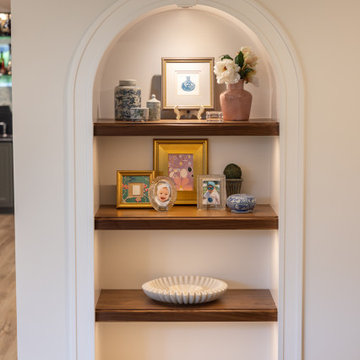Traditional Basement Remodel with Custom Bar & Entertainment Spaces