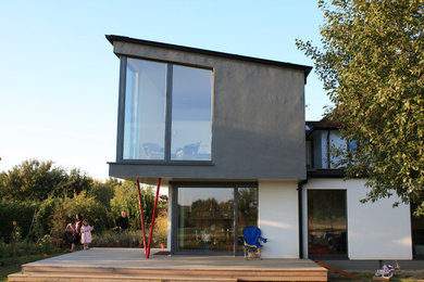 Design ideas for a modern white exterior in Hertfordshire.