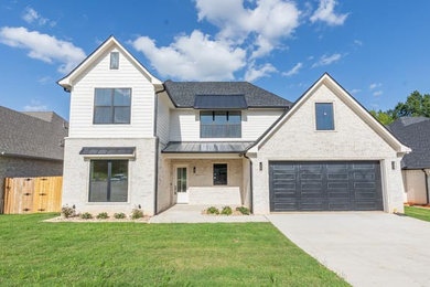 Example of a transitional exterior home design in Dallas